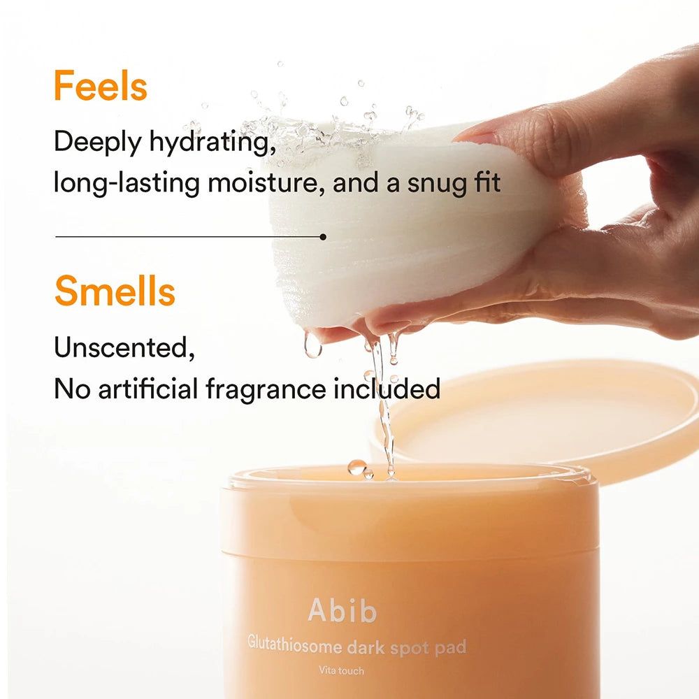 Abib Glutathione Dark Spot Pad container met een schijfje dat vloeistof afgeeft.