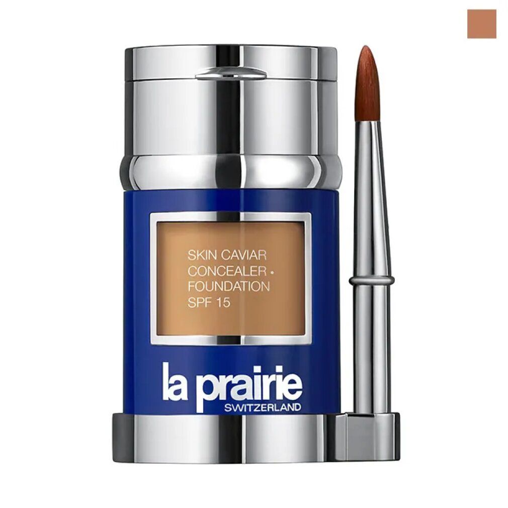 La Prairie Skin Caviar Foundation, Sunset Beige. Récipient bleu, capuchon argenté, pinceau. Informations produit sur le récipient.