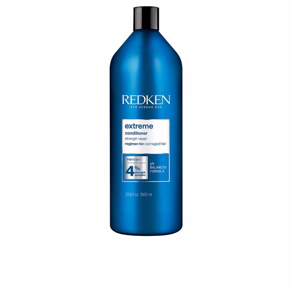 Flacon bleu Redken Extreme Conditioner. Bouchon noir. Texte: Extreme, Conditioner, 33.8 fl oz, 1000 ml.