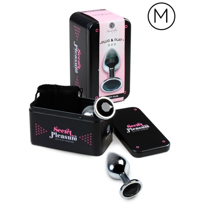 Plug anal en métal avec une large base et des ornements de pierres noires. Boîte de rangement et pochette incluses. Taille M.