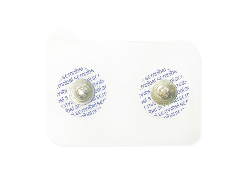 Deux patchs adhésifs ronds avec bouton métallique sur support blanc. Impression avec logo de la marque.