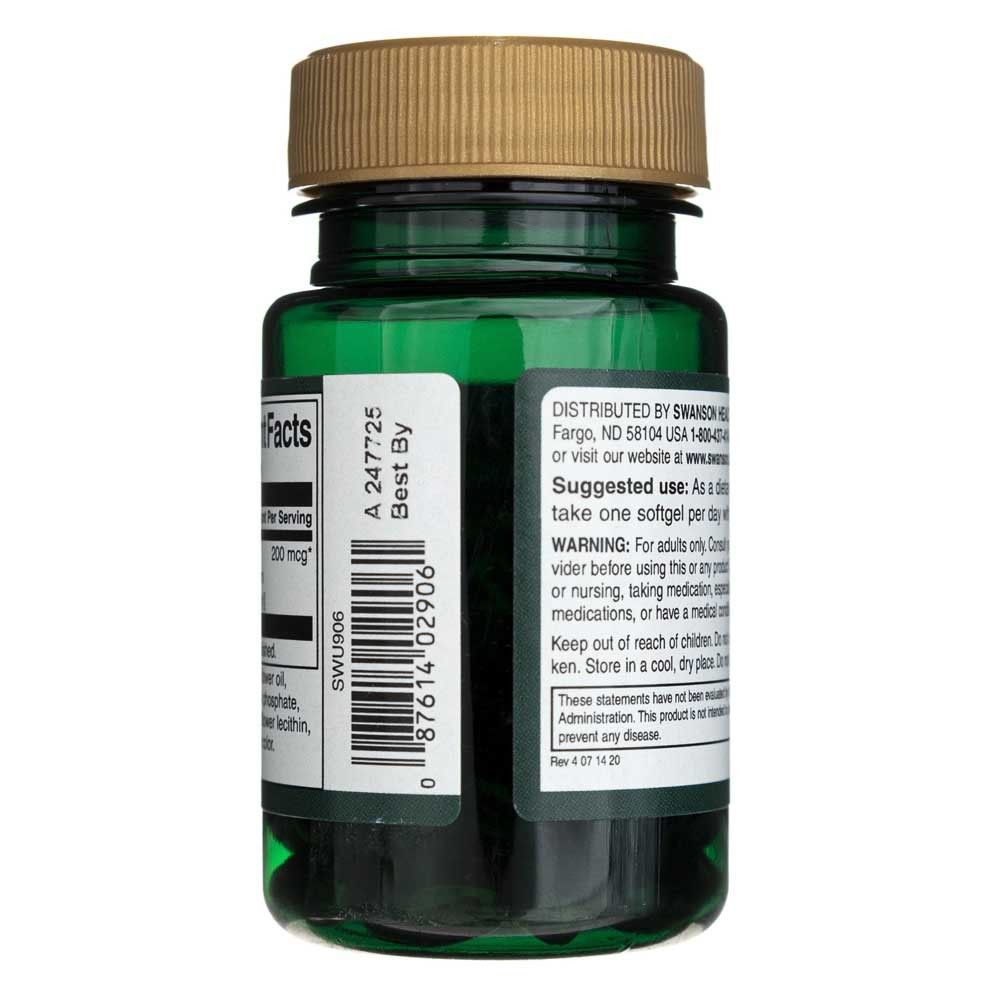 Côté d'une bouteille verte de Swanson Real Food K2, code-barres et date de péremption.