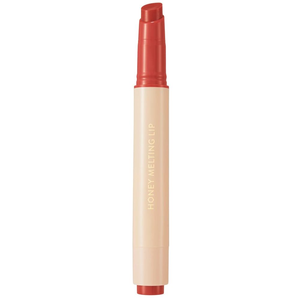 Bâton de gloss. Étui beige avec bâton rouge. Texte: HONEY MELTING LIP.