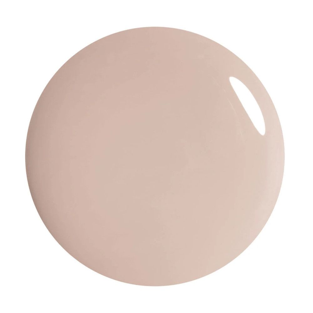Tache circulaire de couleur rose. Surface brillante. Fond blanc.