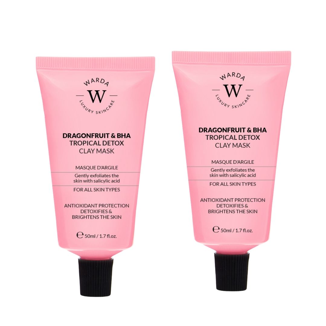 Deux tubes roses avec bouchons noirs. Chaque tube porte l'inscription "Warda Luxury Skincare" et "Dragonfruit & BHA Tropical Detox Clay Mask".