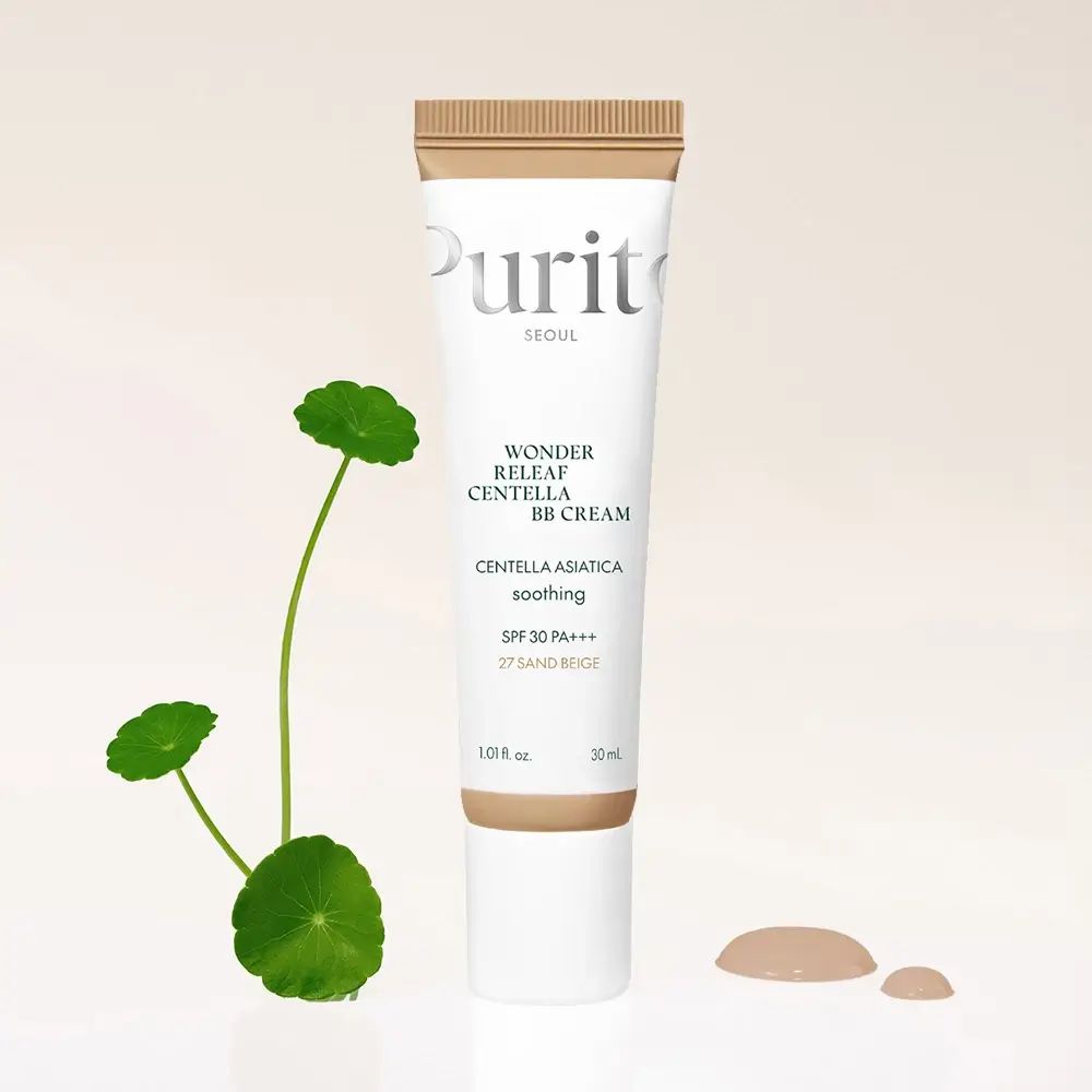 Tube de crème BB avec feuilles vertes. Tube blanc avec bouchon marron. Texte: Wonder Releaf Centella BB Cream, SPF 30 PA+++, 27 Sand Beige.