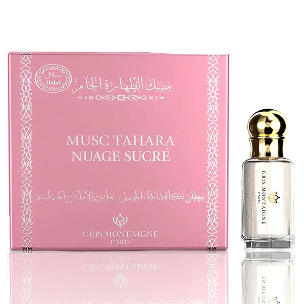 Emballage rose avec flacon. Inscription: Musc Tahara Nuage Sucré. Flacon avec bouchon doré.