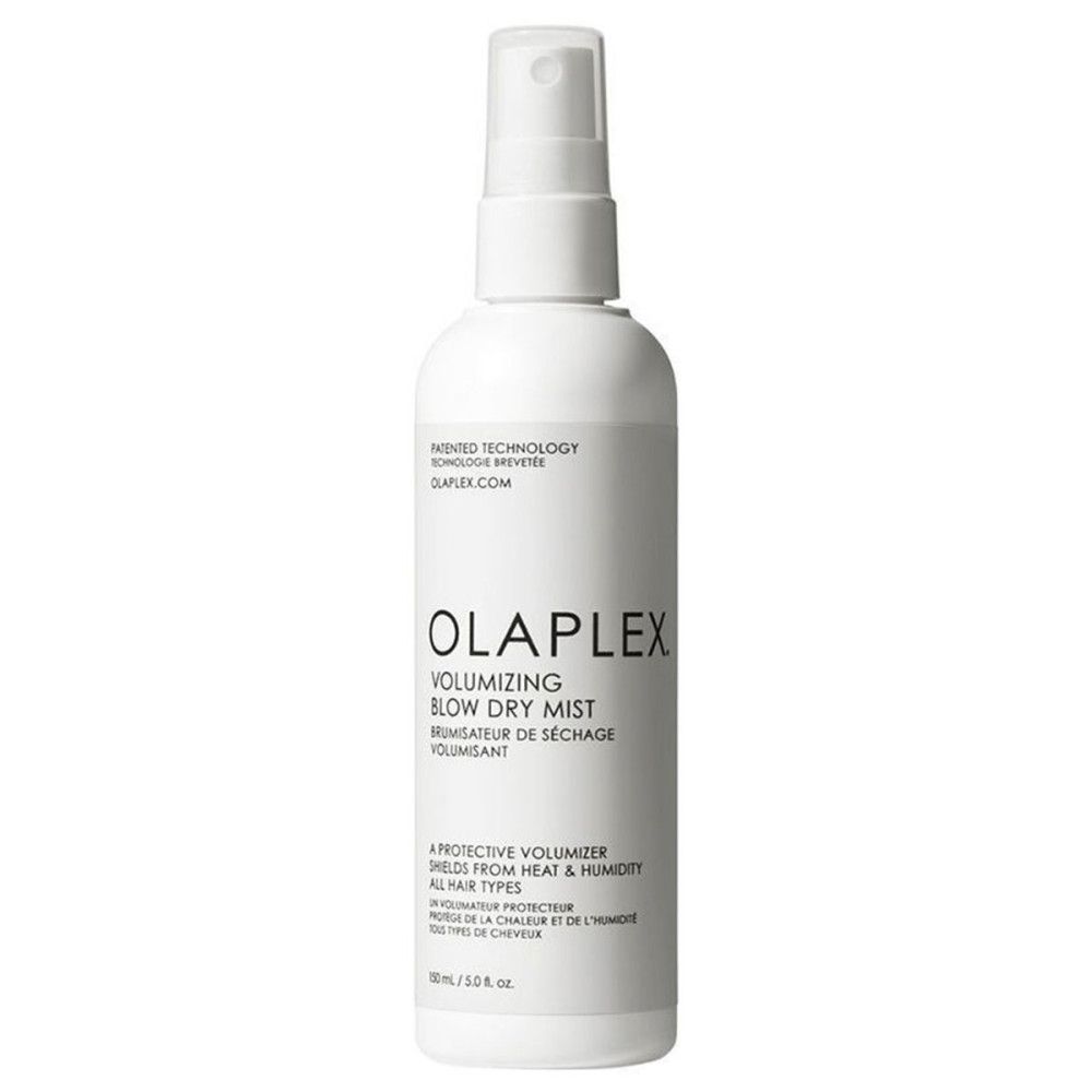 Flacon blanc Olaplex Volumizing Blow Dry Mist. Nom et logo du produit visibles.