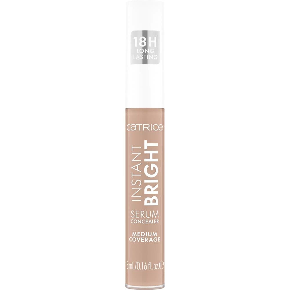 Tube de correcteur avec applicateur. Inscription : INSTANT BRIGHT, SERUM CONCEALER, MEDIUM COVERAGE. 18H Long Lasting.