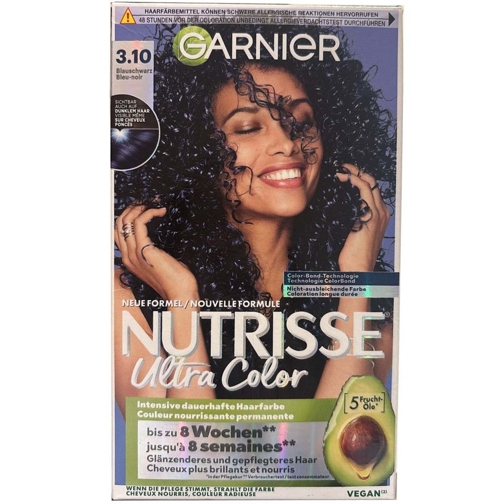 Garnier Nutrisse Ultra Color haarverf. Verpakking met afbeelding van vrouw met krullend haar. Bevat avocado-olie. Vegan.