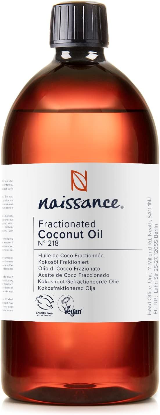 Bruine glazen fles met wit etiket. Opschrift: Naissance, Fractionated Coconut Oil. Vegan-zegel.