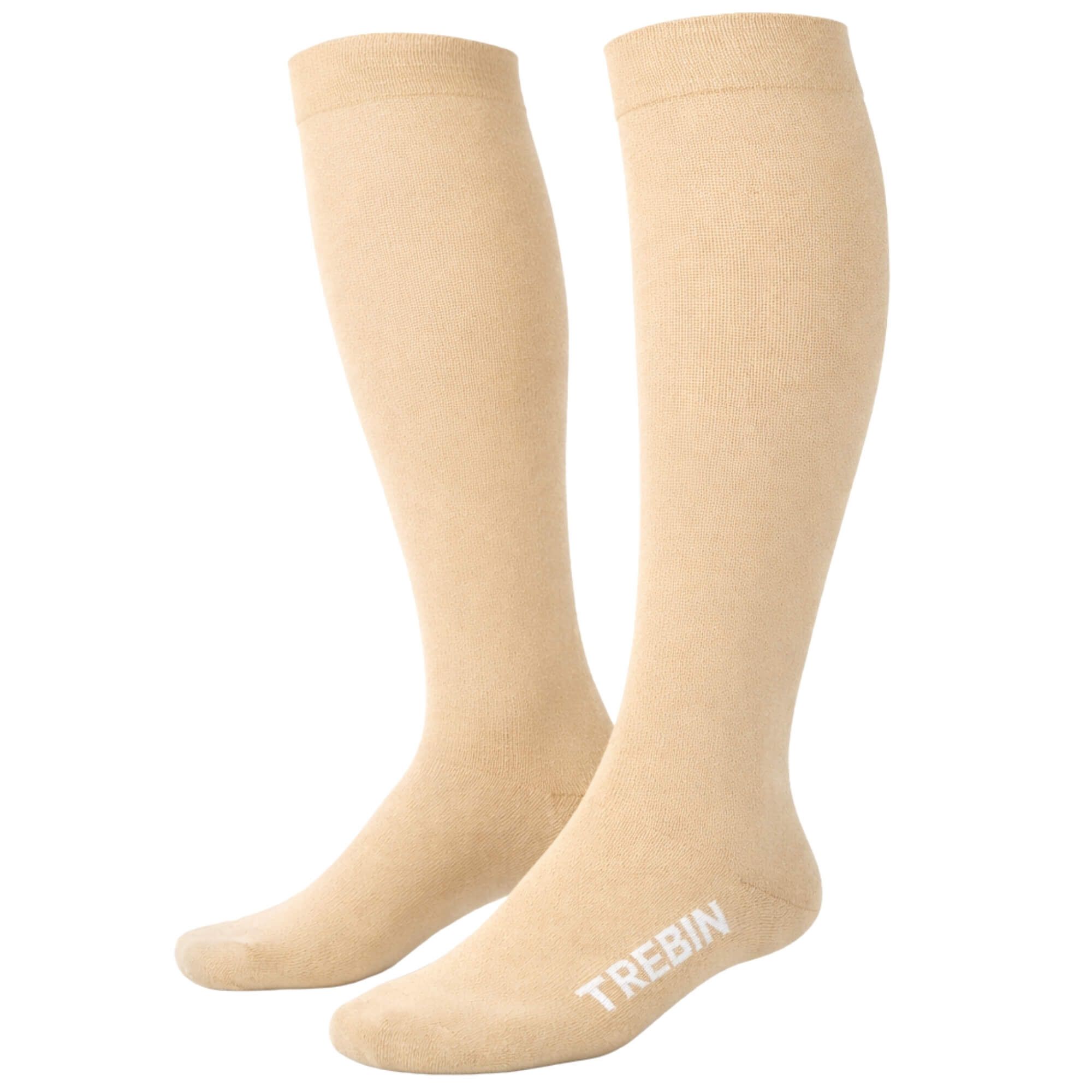 Huidkleurige compressiekousen met pijl. Zachte vezels, ademend, vochtafvoerend, ultrafijn.