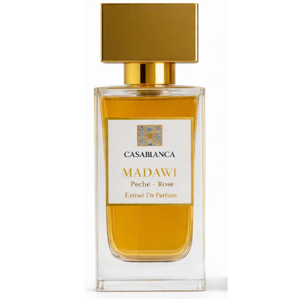 Glazen fles met gouden dop. Etiket met productnaam en details. Vloeistof amberkleurig.