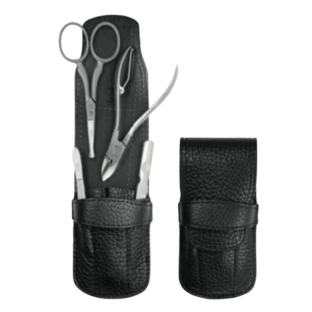 Trousse de manucure noire avec étui. Ciseaux, coupe-ongles, lime et autres outils. Aspect cuir. Outils individuels dans un étui.
