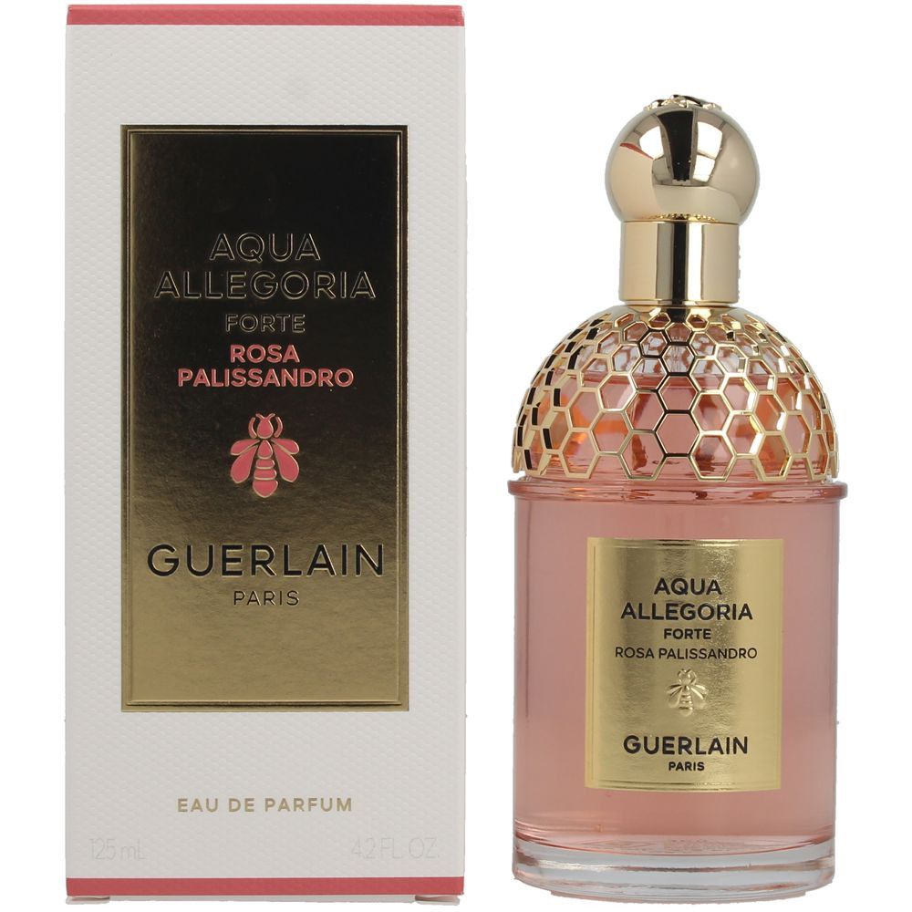 Flacon de parfum et emballage. Flacon avec bouchon et étiquette dorés. Emballage avec logo et nom du produit.