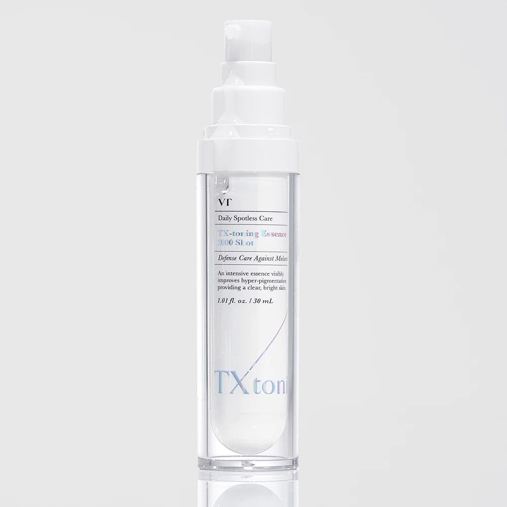 Pompe blanche sur flacon transparent avec étiquette bleue indiquant 'TX-ton'.