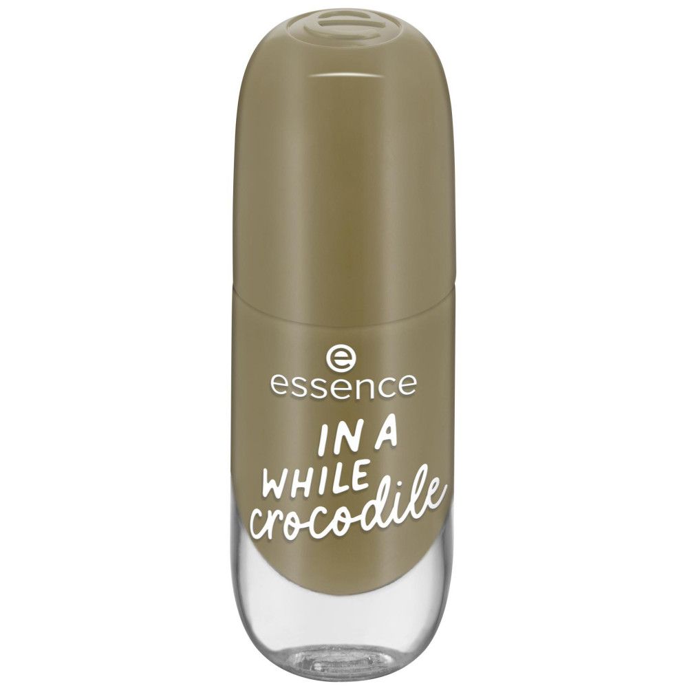 Flacon de vernis à ongles fermé. Vernis à ongles doré. Inscription: Essence, IN A WHILE crocodile.