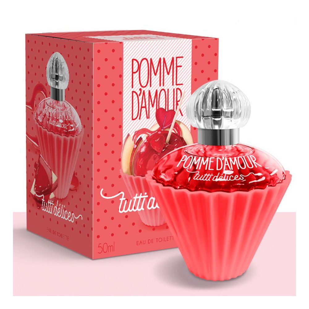 Flacon rouge, bouchon argenté. Boîte avec image du produit et texte 'Pomme d'Amour'. 'Eau de Toilette'.