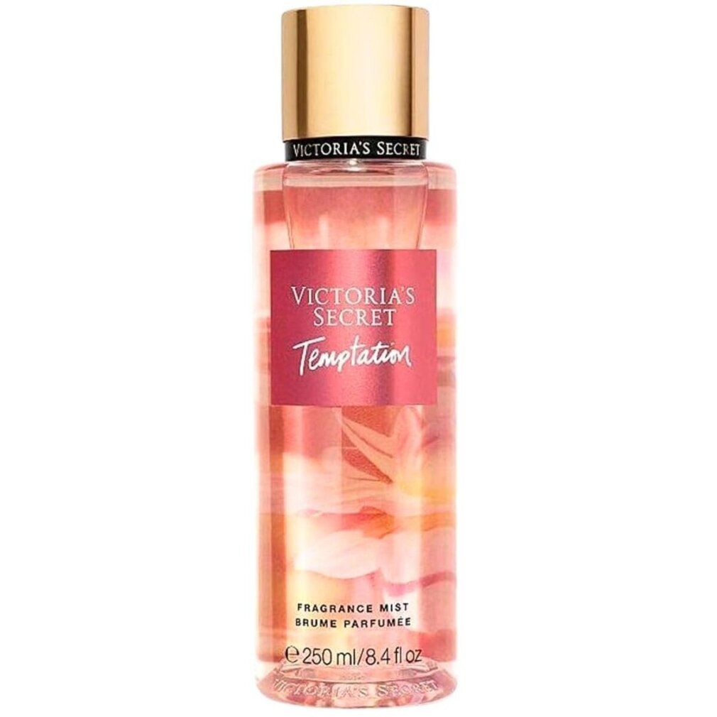 Vaporisateur de brume parfumée Victoria's Secret Temptation. Flacon rose avec bouchon doré. Texte : Victoria's Secret, Temptation.