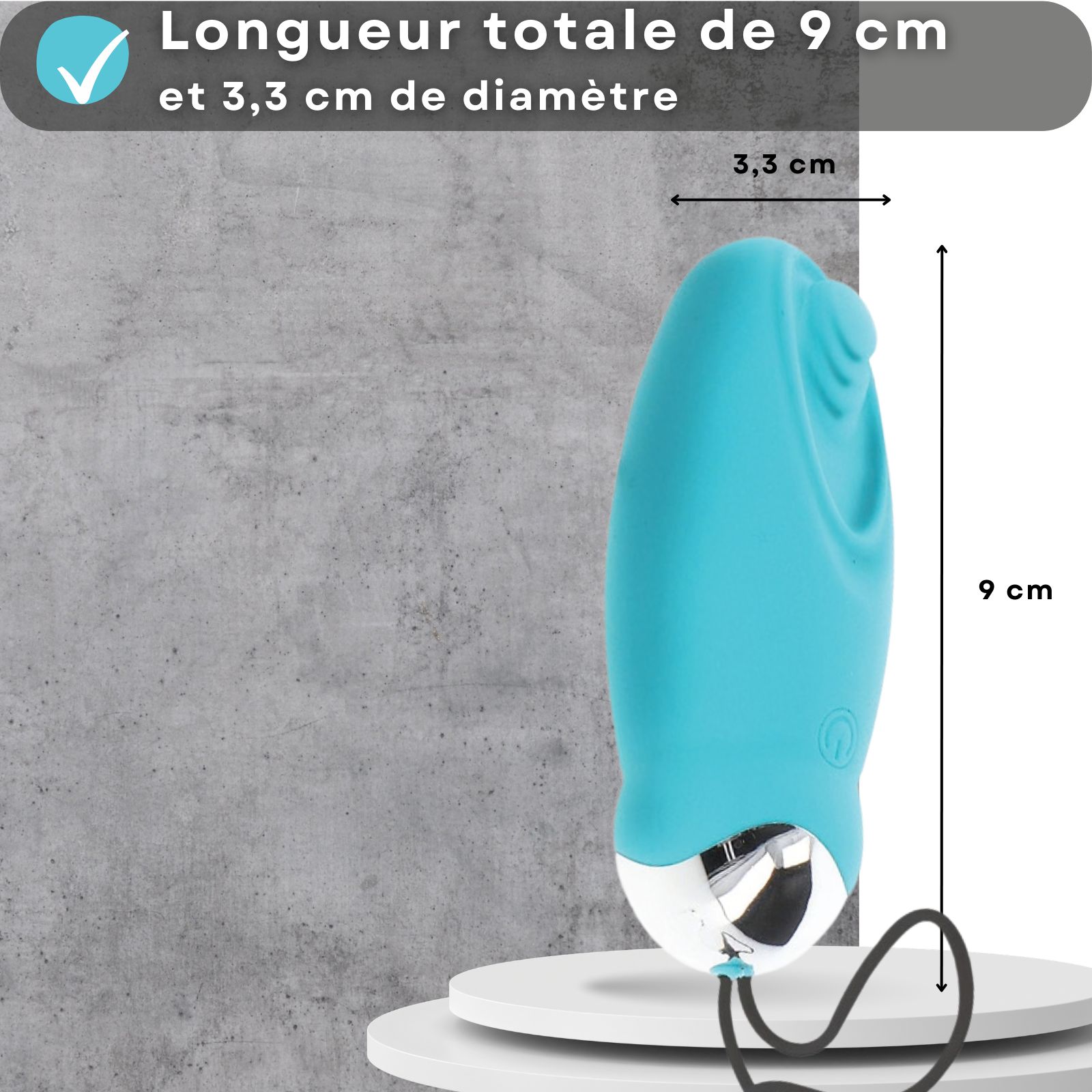 Oeuf vibrant bleu. Texte: 8 vibrations, rechargeable USB. Mains formant un cœur. Fond: coucher de soleil.