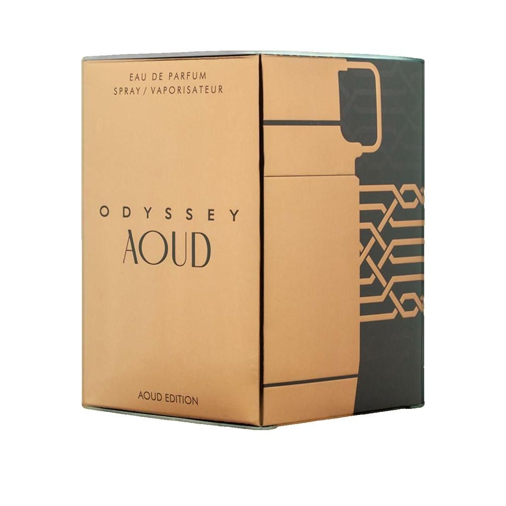 Kartonnen verpakking in goud en zwart. Opschrift "ODYSSEY AOUD" en "EAU DE PARFUM".