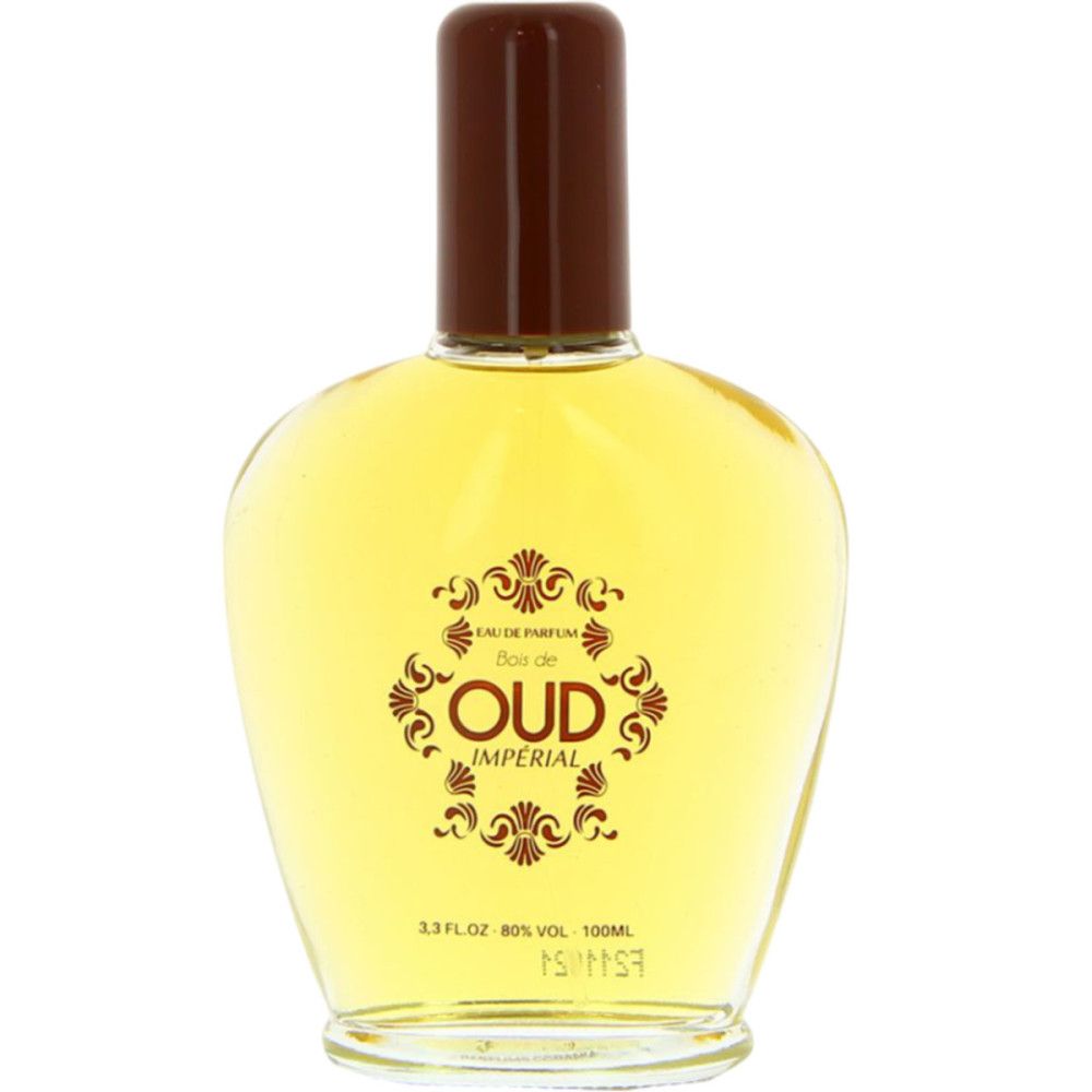 Parfumfles met bruine dop. Opschrift "Bois de Oud Imperial". Gele vloeistof in een transparante fles.