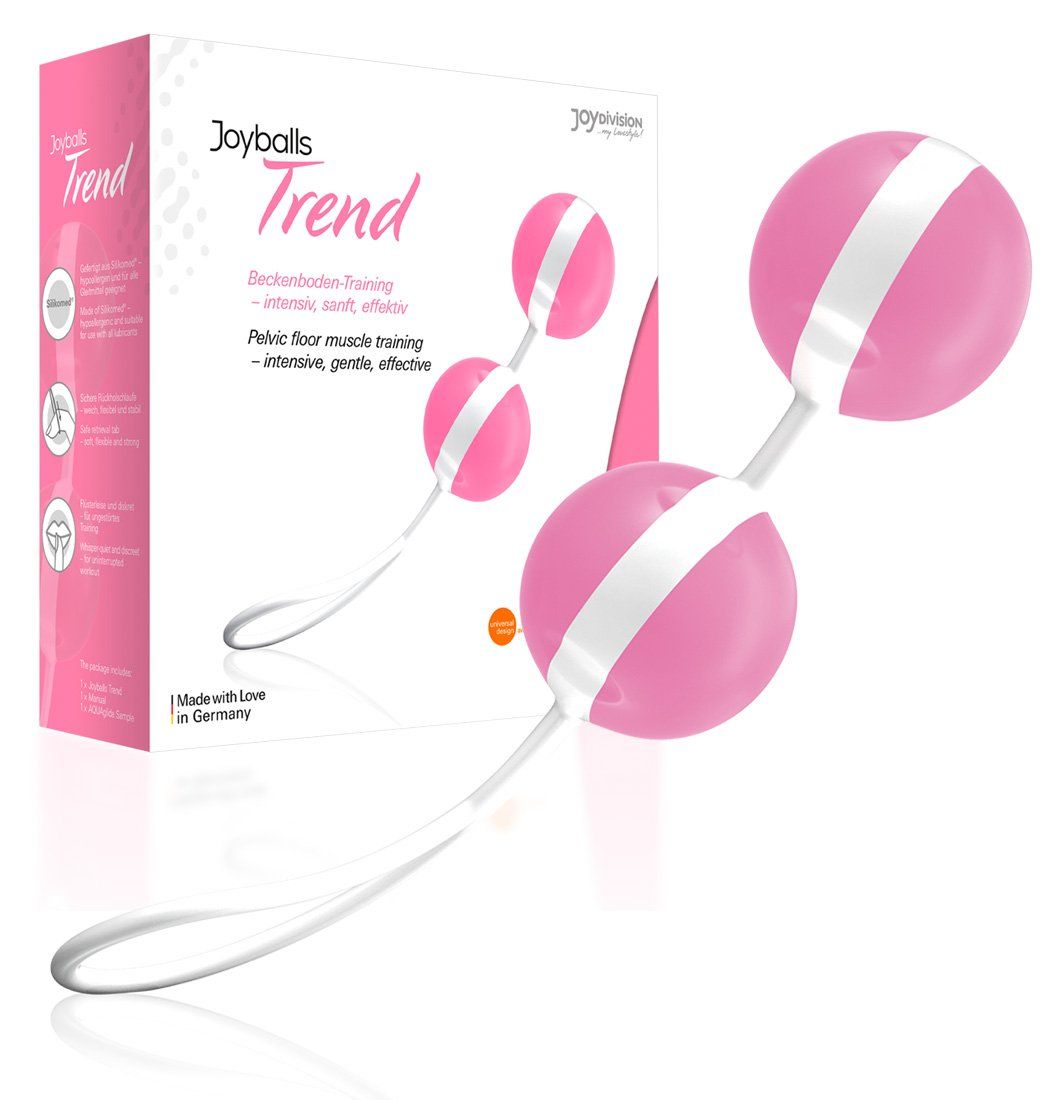 Twee roze ballen met witte strepen, verbonden door een koord met lus. Verpakking op de achtergrond.