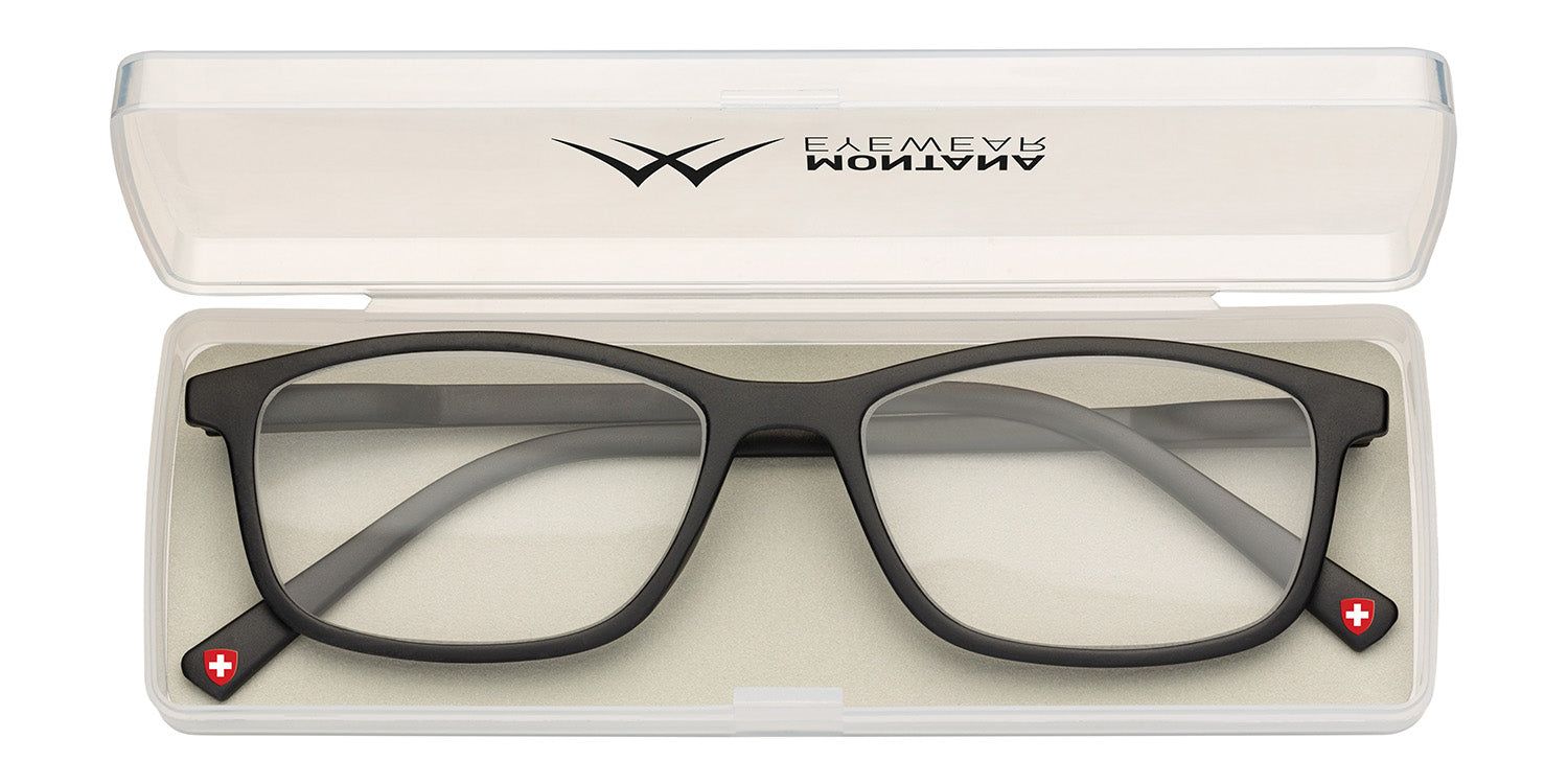 Lunettes noires dans un étui blanc ouvert. L'étui porte l'inscription "EAGLE EYE ANATOMY". Une croix suisse est visible sur la branche des lunettes.