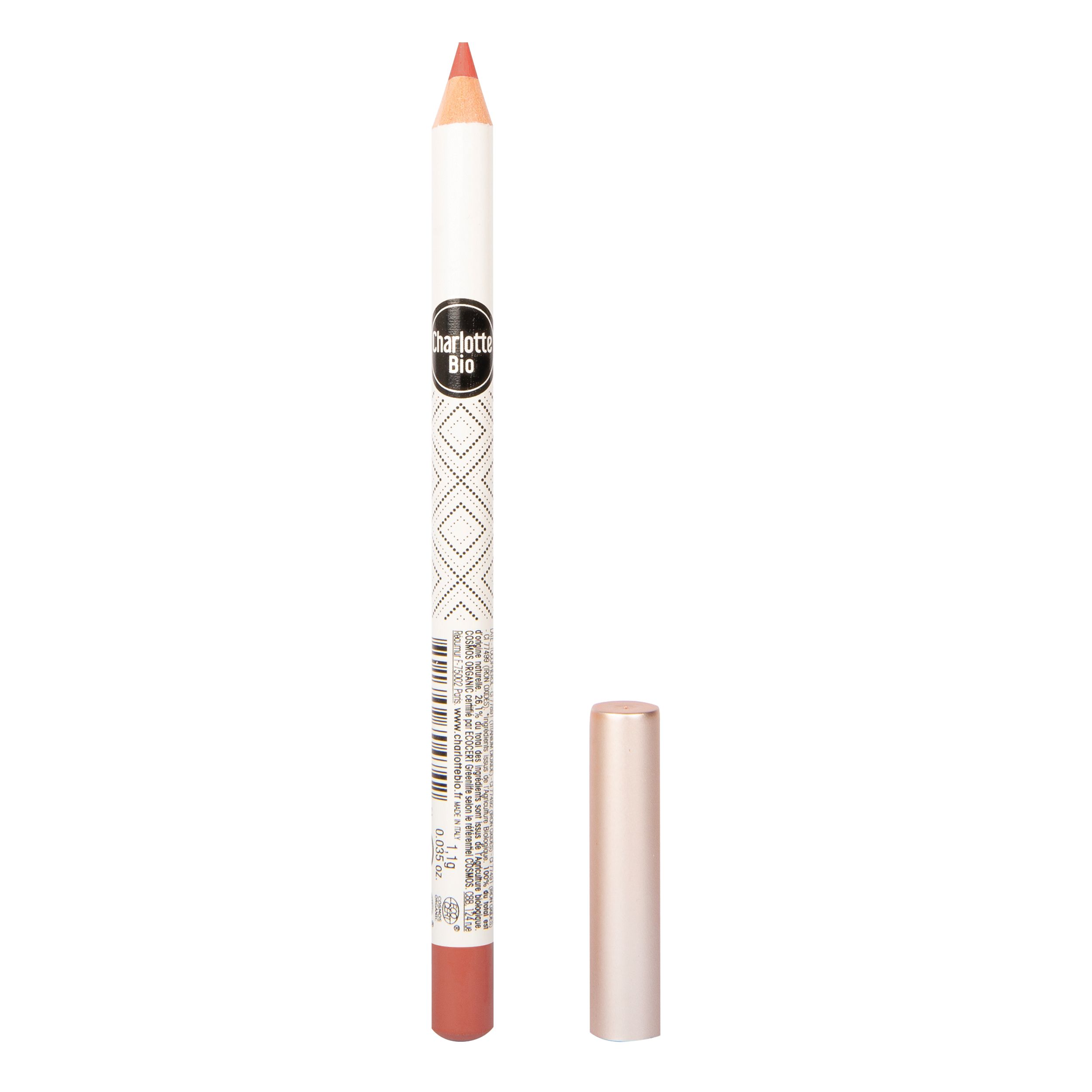 Roze lippenpotlood met dop. Merk Charlotte Bio. Witte potlood met geometrisch patroon. Roze punt en basis.