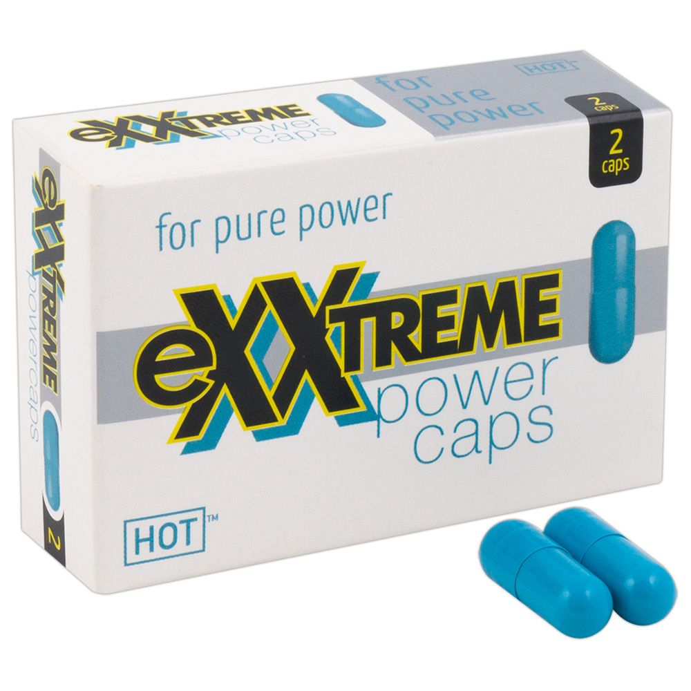 Deux gélules bleues à côté de l'emballage "eXXtreme power caps".