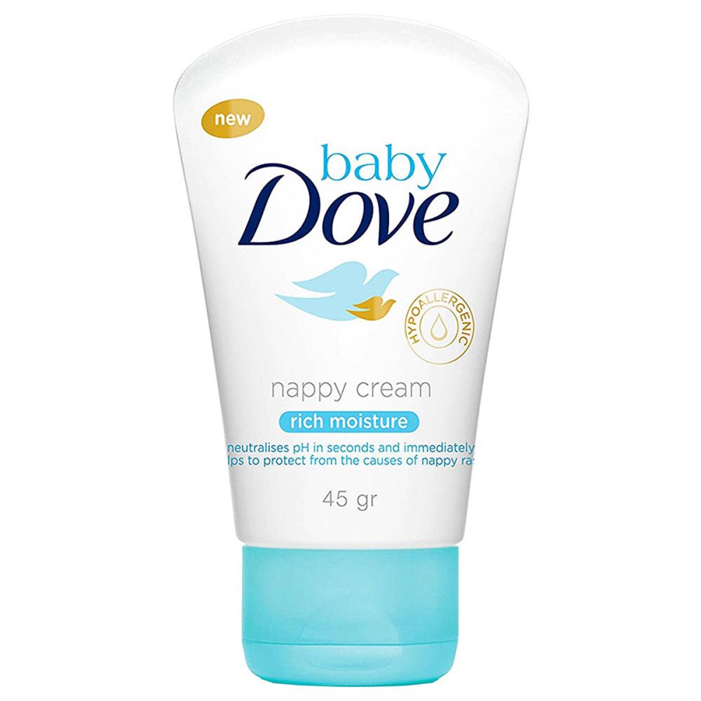 Crème pour bébé Dove. Tube blanc avec bouchon bleu. Inscription : Baby Dove, nappy cream, rich moisture. Hypoallergénique. 45 gr.