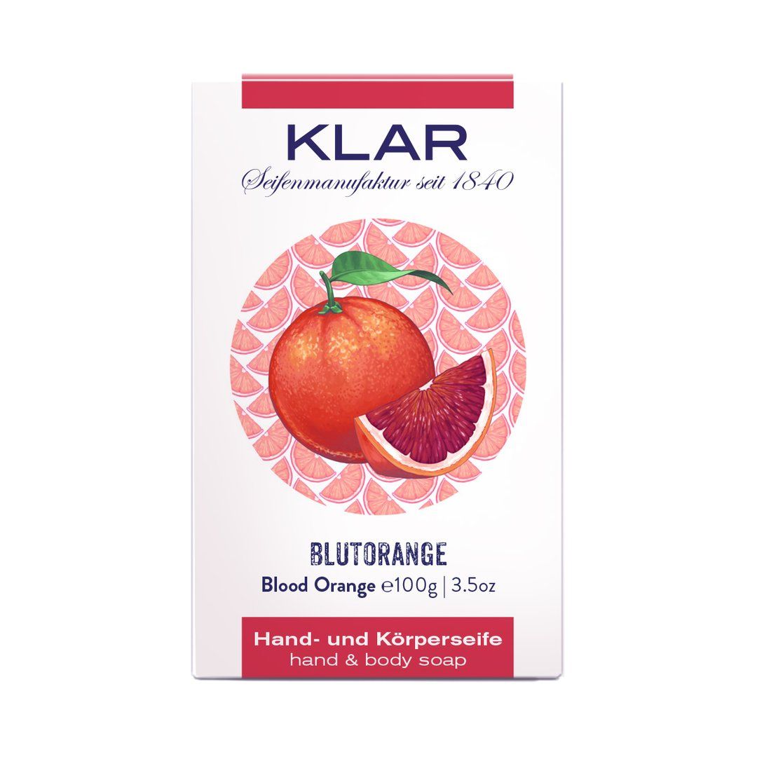 Verpakking met bloedsinaasappel illustratie. Tekst: KLAR, Blutorange, hand- en lichaamszeep. Witte verpakking met rode tekst.