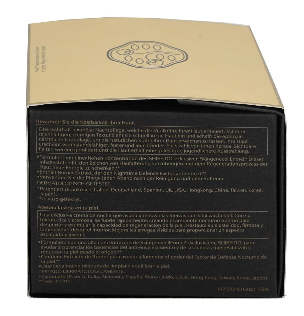 Achterkant van de gouden doos. Meertalige tekst. Logo bovenaan. Tekst: Dermatologisch getest.