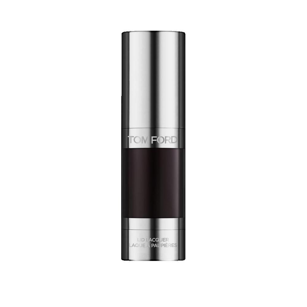 Flacon de maquillage cylindrique. Capuchon et base argentés, corps foncé. Inscription TOM FORD et nom du produit.