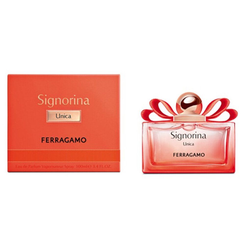 Boîte orange et flacon. Flacon rectangulaire rose avec bouchon doré et nœud rouge. Inscription Signorina Unica Ferragamo.