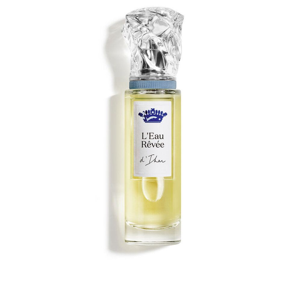 Flacon de parfum avec bouchon transparent et liquide jaune. Texte : L'Eau Rêvée d'Ikar.