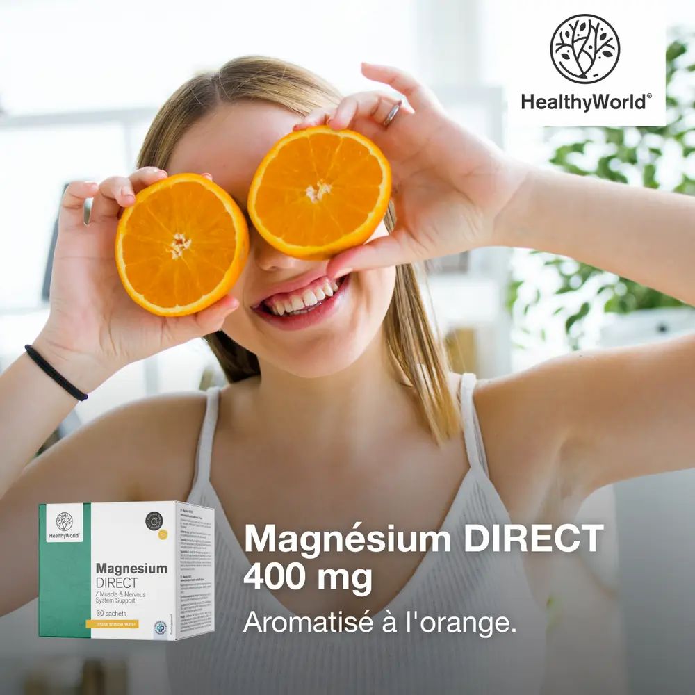 Femme avec des oranges devant les yeux. Magnesium DIRECT 400 mg, aromatisé. Marque HealthyWorld.