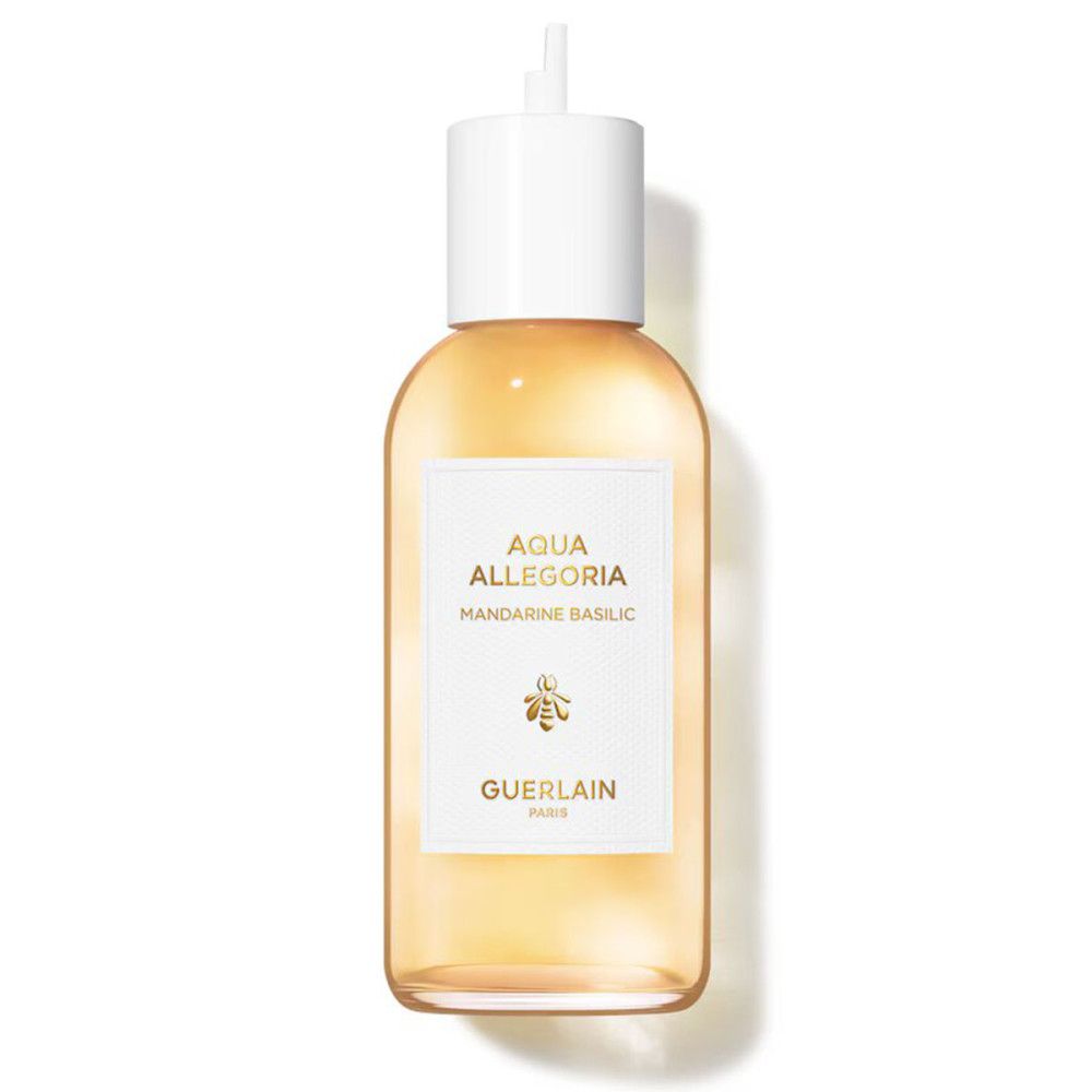 Fles met witte sluiting. Opschrift Aqua Allegoria Mandarine Basilic en Guerlain. Gele vloeistof.