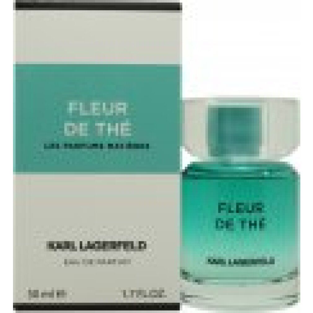 Fles en verpakking. Fles: turquoise, transparant. Verpakking: wit, turquoise. Opschrift: Fleur de Thé, Karl Lagerfeld.