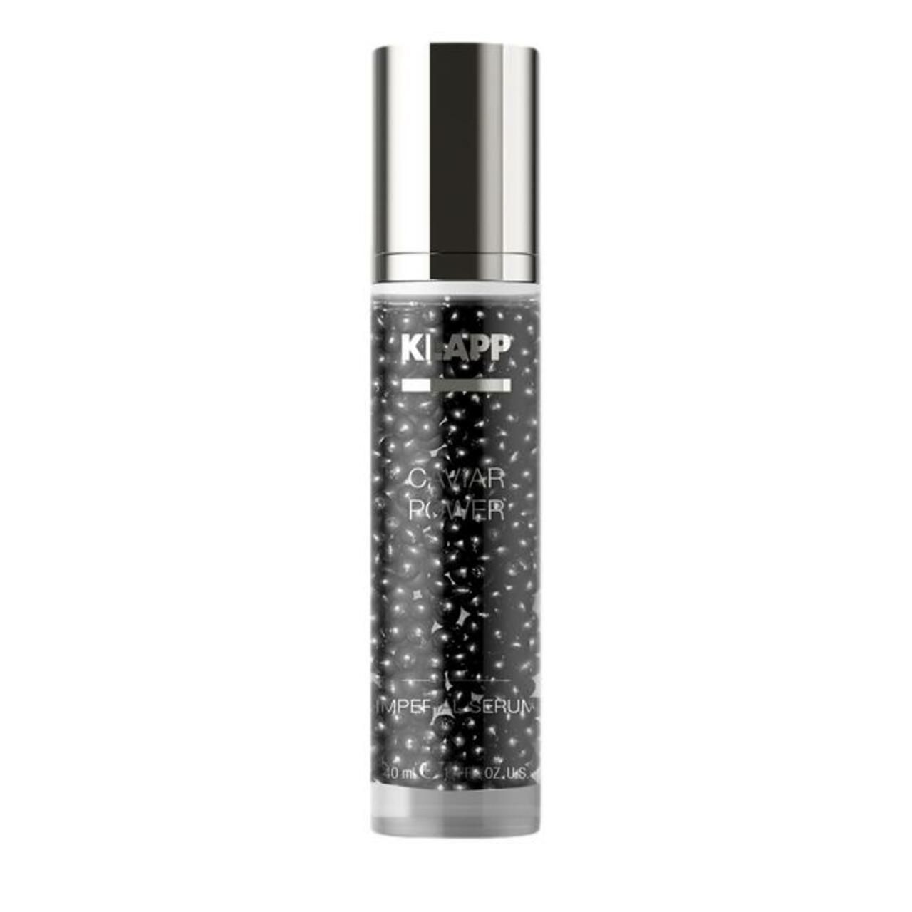 KLAPP Caviar Power Imperial Serum dans un flacon en verre avec distributeur argenté et perles noires.