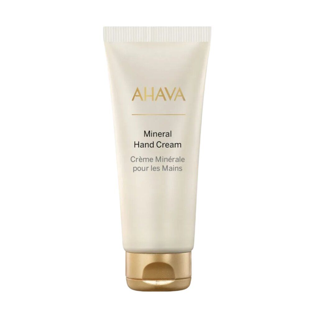 Tube de crème avec logo AHAVA. Inscription : Mineral Hand Cream, Crème Minérale pour les Mains.