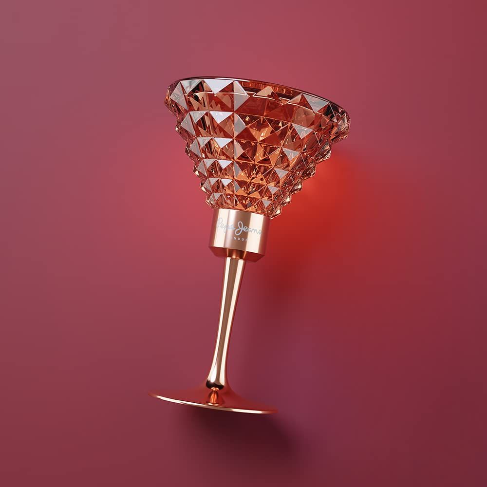 Parfumfles in kelkvorm. Roze glas met geometrisch patroon. Gouden steel en voet. Merk Pepe Jeans London.