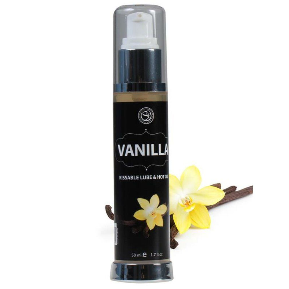 Zwarte fles met "Vanilla" en gele bloem. Vanillestokjes en bloem ernaast. Doseerpomp.