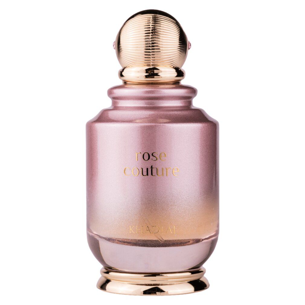 Flacon de parfum rose avec un bouchon doré côtelé et une pierre rose.