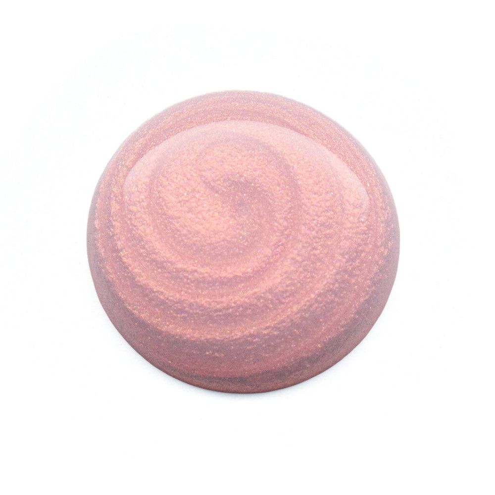 Tourbillon de vernis à ongles rose. Couleur nacrée.