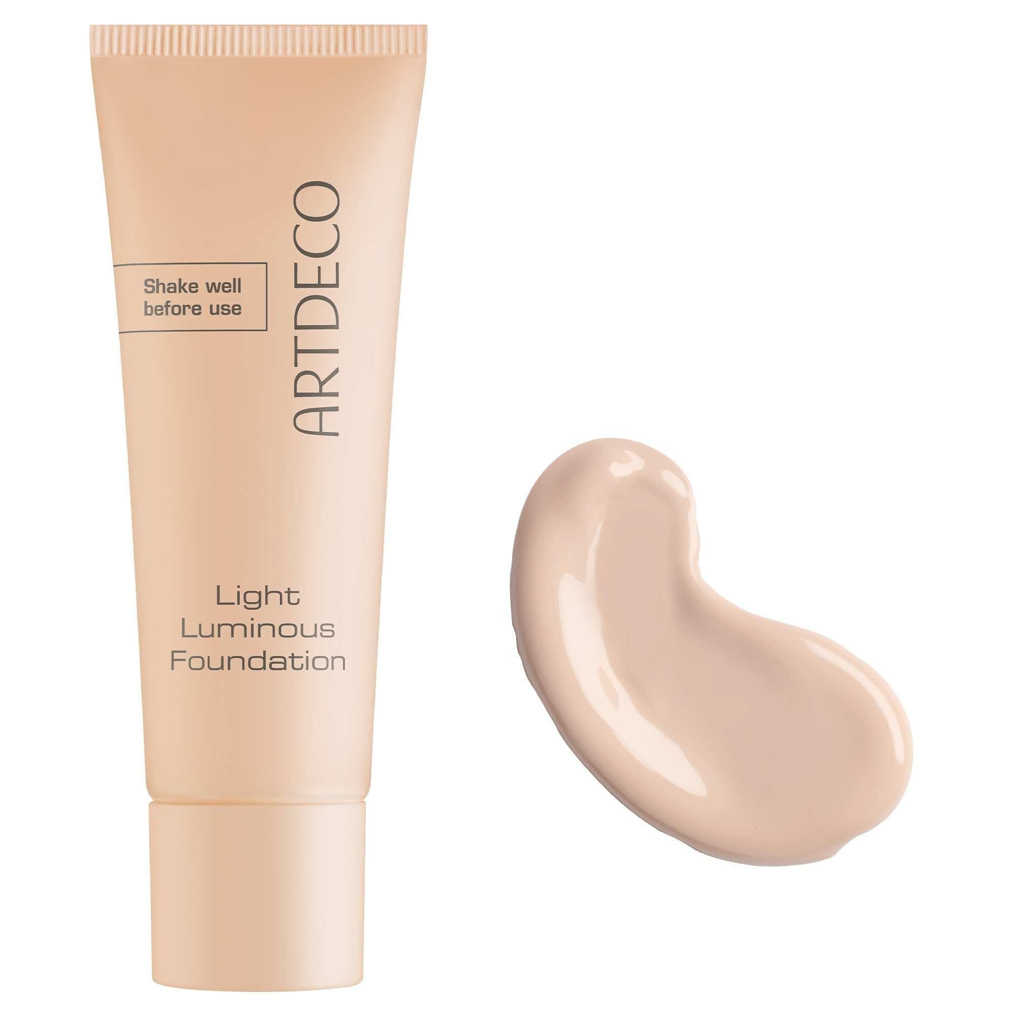 Beige tube en vlek foundation. Opschrift: ARTDECO, Light Luminous Foundation. Tekst: Shake well before use.