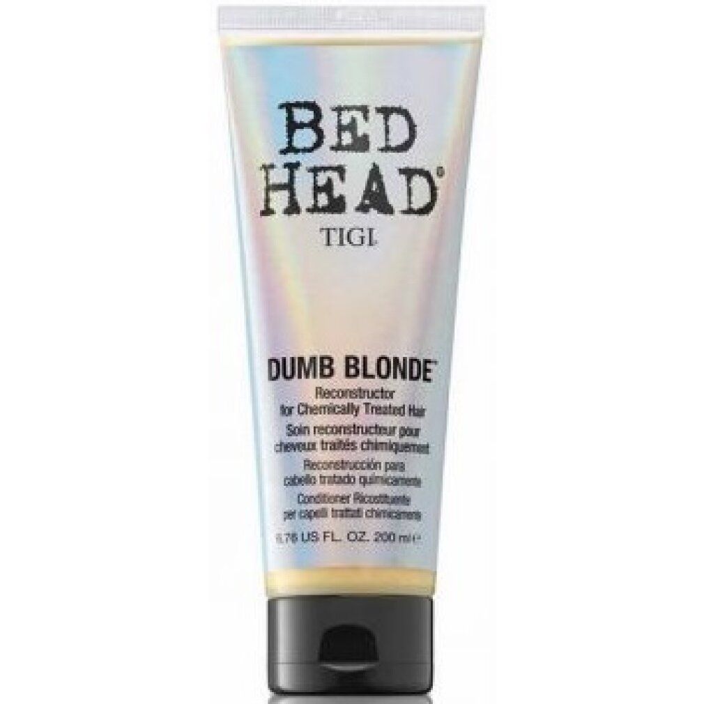 Conditionneur Tigi Bed Head Dumb Blonde. Tube avec bouchon noir. Nom du produit et informations sur l'emballage.