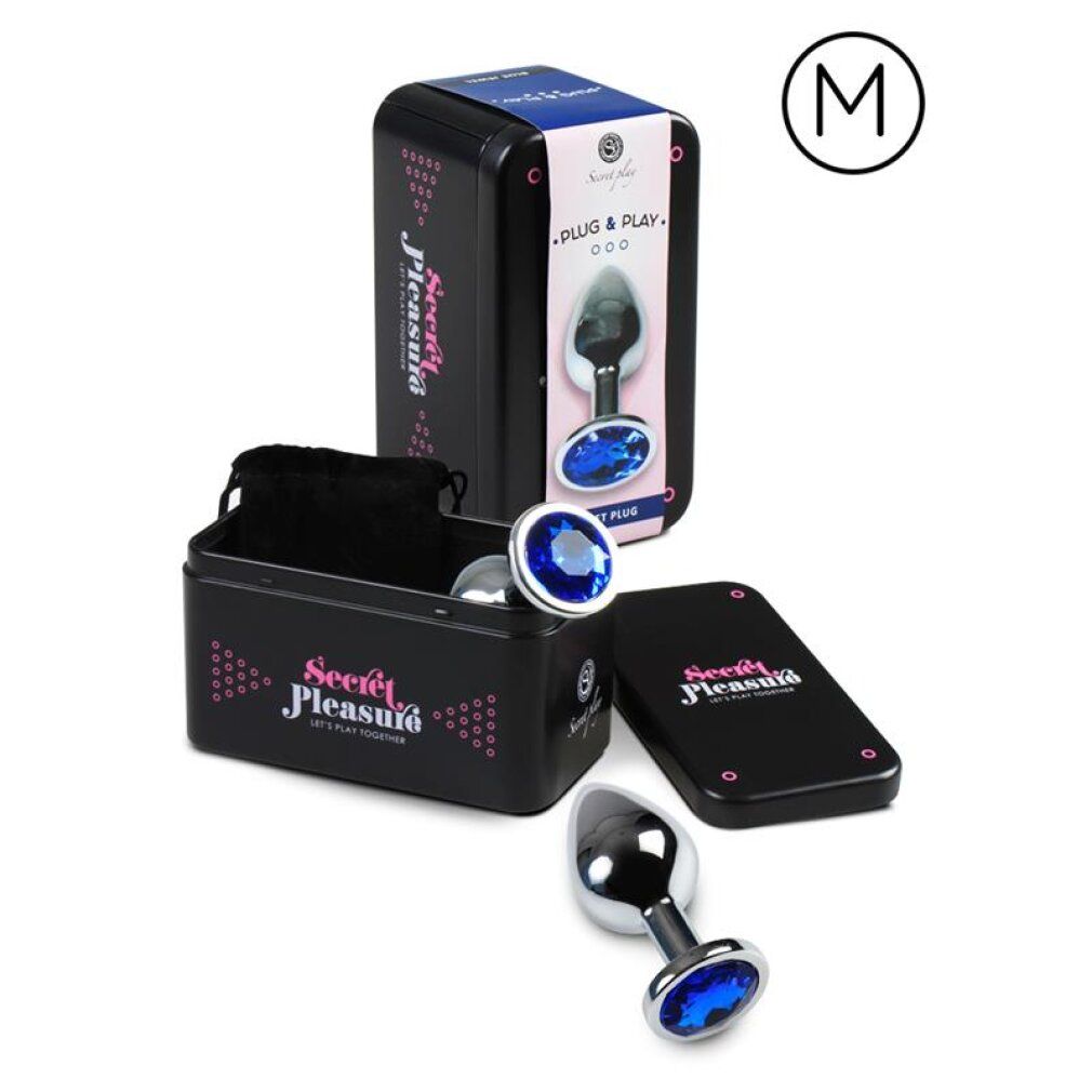 Plug anal avec un bijou bleu, base et tige en métal, présenté en boîte.