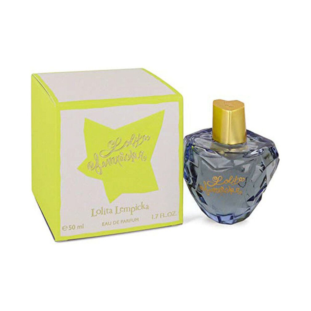 Blauwe fles en doos. Opschrift "Lolita Lempicka". Doos met sterpatroon en tekst.
