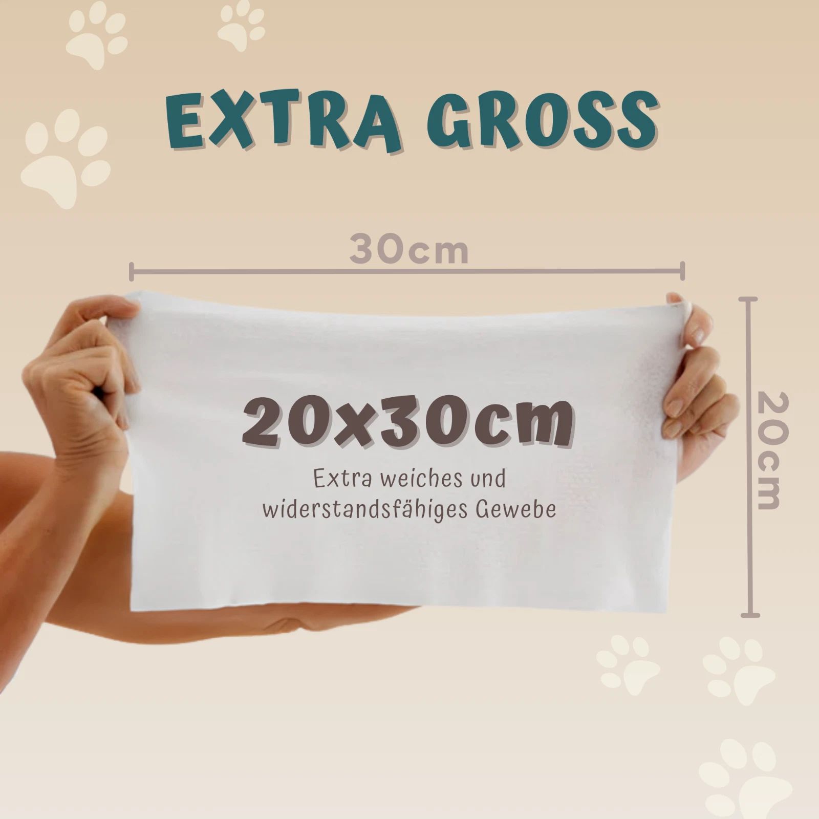 Lingette blanche, 20x30cm. Texte: Tissu extra doux et résistant. Dimensions en cm. Mains tenant la lingette.